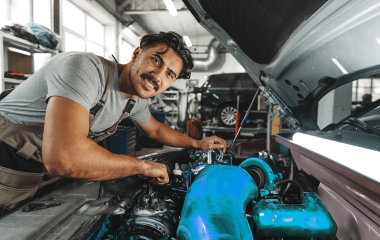 9 young male mechanic examining engine under hood of 2023 05 17 17 11 32 utc copy