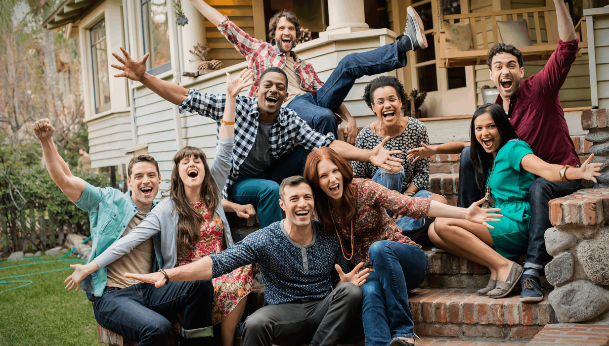 a group of friends sitting on the steps of a house 2022 03 04 02 20 06 utc