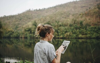 tinywow woman alone in nature using a digital tablet inter 2022 12 15 22 55 26 utc 33697699